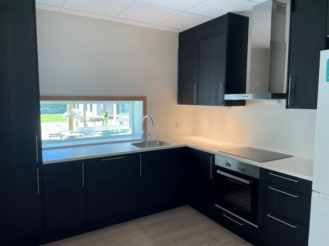 Kjøkken i en av leilighetene. Foto.